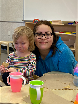 Logan Christopher Rhodes Allen enjoying a snack time at the new daycare.