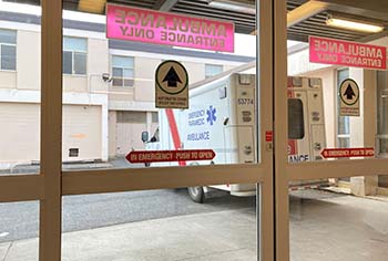 A view from inside the hospital looking out at the ambulance bay 