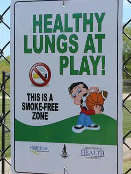 Sign reading "healthy lungs at play"