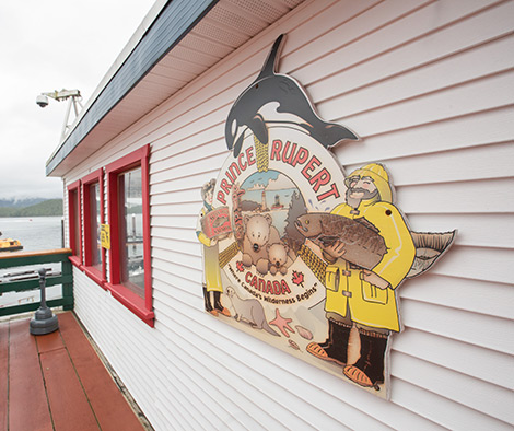 A Prince Rupert sign on the side of a building