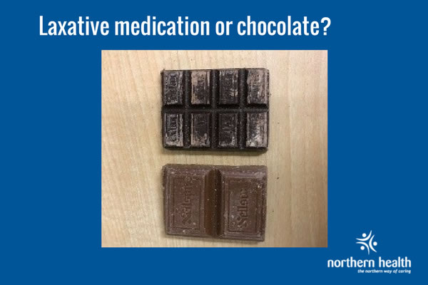 Laxative medication and chocolate pieces beside each other.