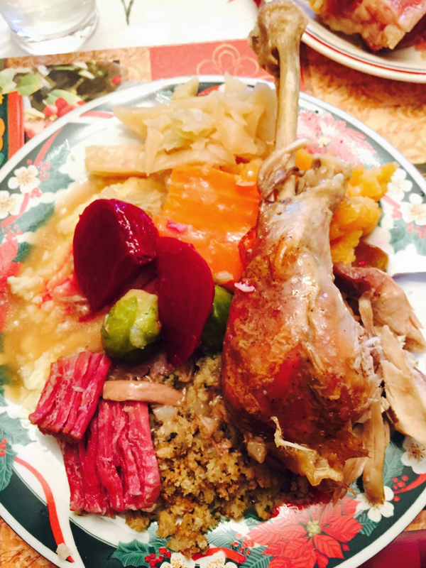 Plate with a Turkey drumstick, carrots, beets and cabbage