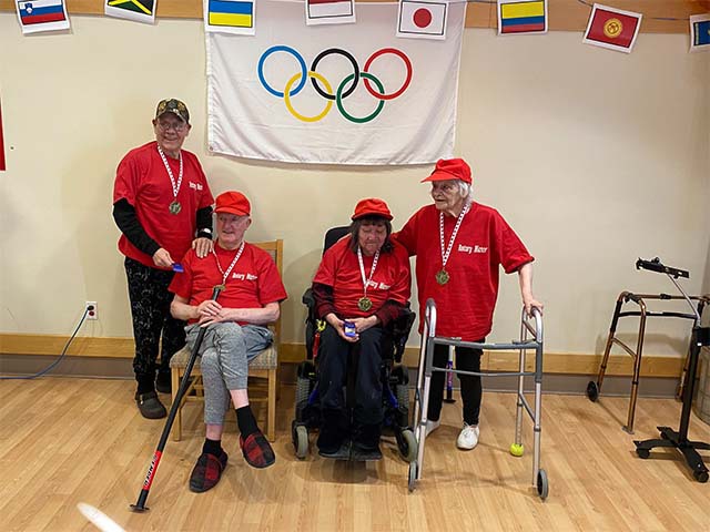 Winning team shows off medals