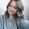 Woman with wavy brown hair