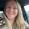 Woman smiling with long blonde hair