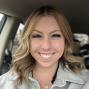 Woman smiles in car