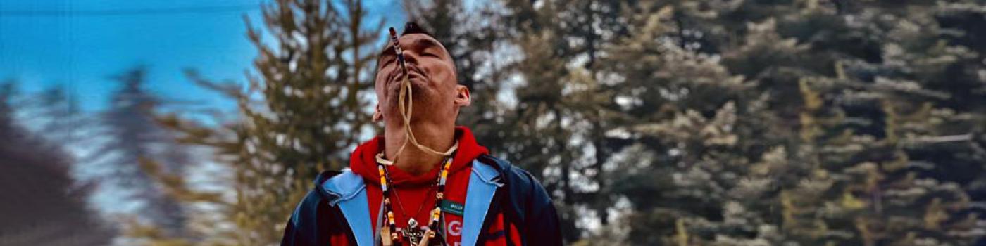 Billy standing outside