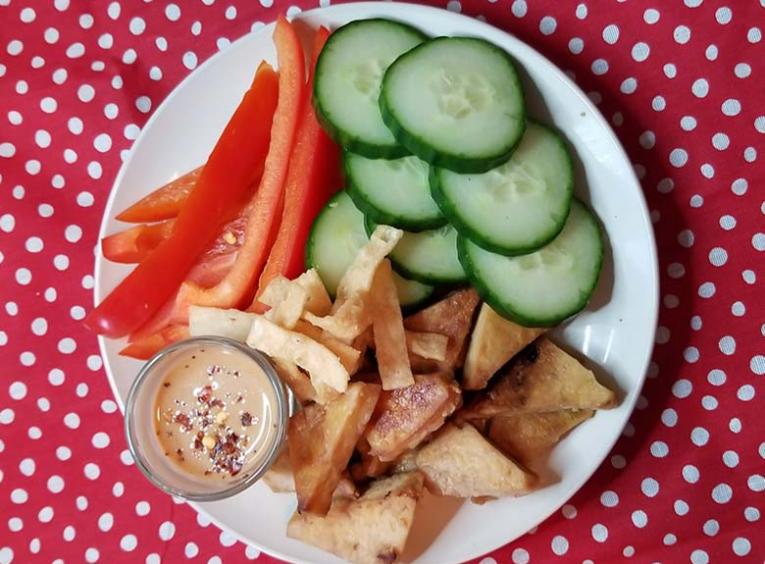 Plate of tofu and veggies.