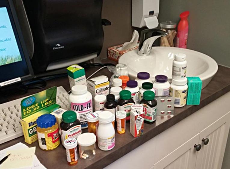 A wide variety of medications on the counter.