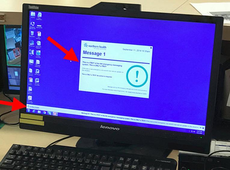 A desktop computer screen showing a popup test message.