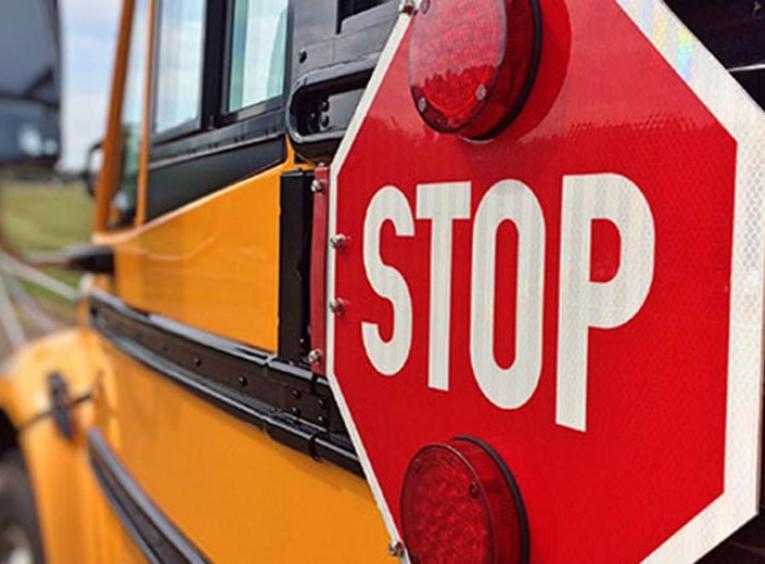 Stop sign on a school bus.