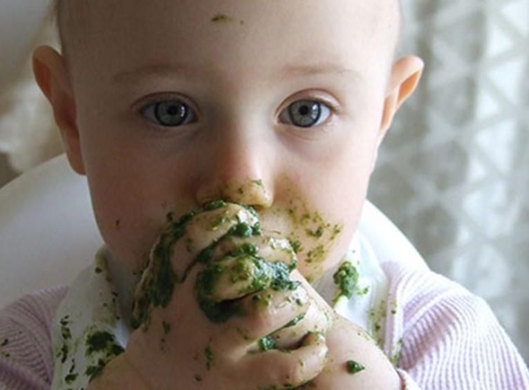 Baby eating solids.