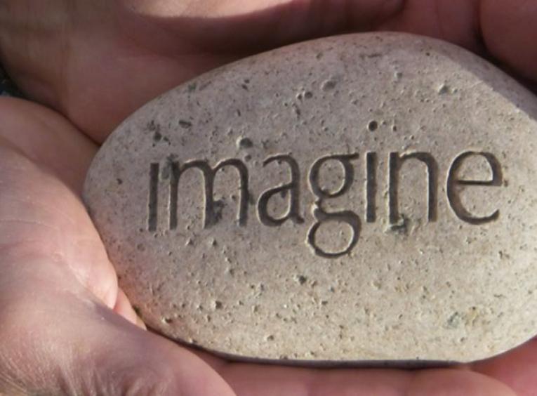 Rock with the word IMAGINE on it.