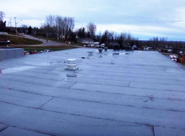 A flat roof is shown.