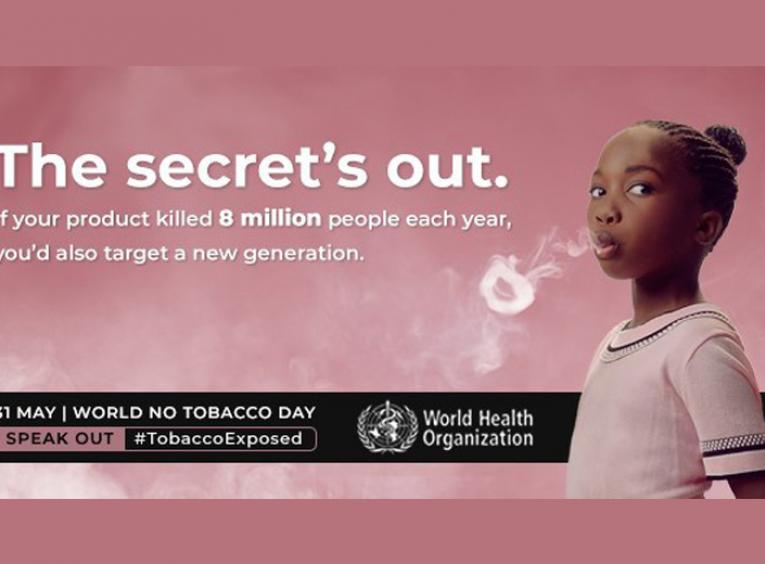 A WHO image for World No Tobacco Day shows a young girl blowing a smoke ring. 