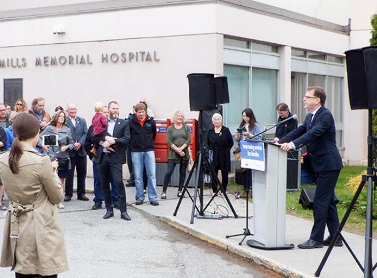 A press conference outside of Mills Memorial Hospital. 