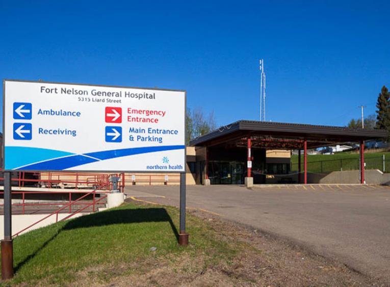Front entrance of the Fort Nelson hospital and sign