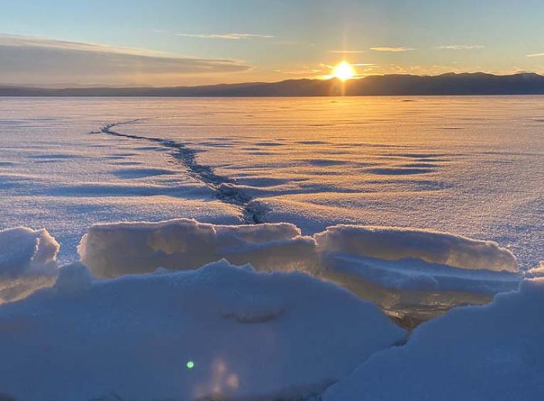 Stuart lake in February. An ice covered lake looks safe to walk on but could be dangerous.