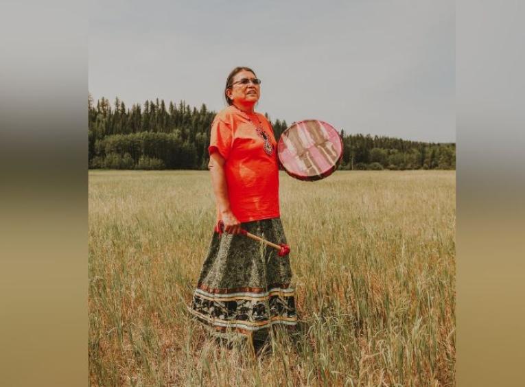 Lena Hjorth Drumming in a field