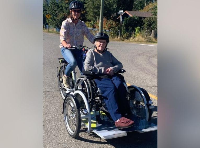 Bulkley Lodge Recreation Assistant Shannon Malbeuf takes resident Ruth Mesich for a pedal in the lodge’s new wheelchair bike.