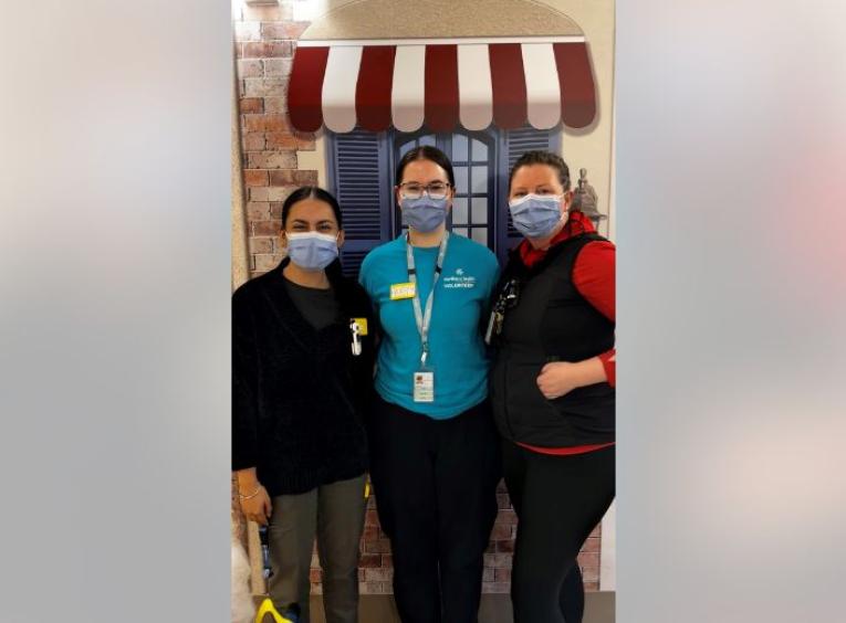 Neetu Kuar (Recreational Therapist), Avery (Volunteer), and Megan Moman (Nursing Assistant/Activity Worker).
