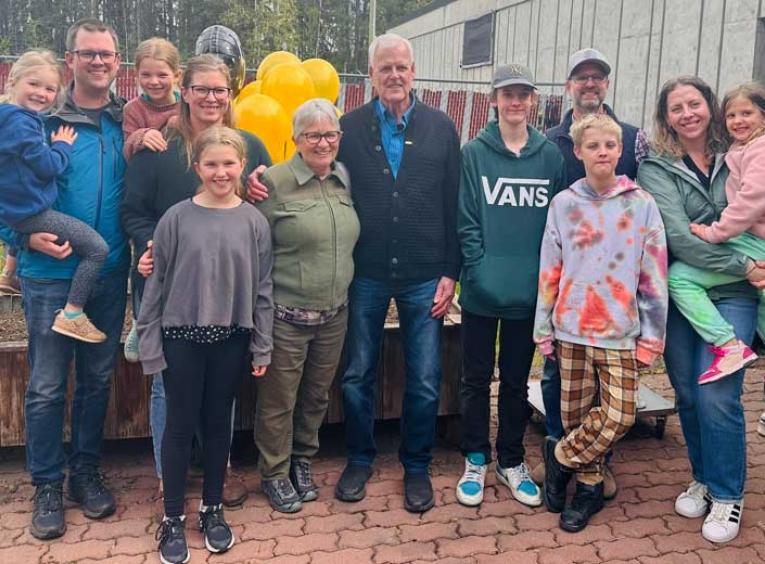 Cor van der Meulen (centre), with his wife, three sons, and their families, celebrated his retirement from Northern Health in April 2024. 