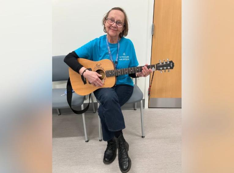 Hazel and her acoustic guitar
