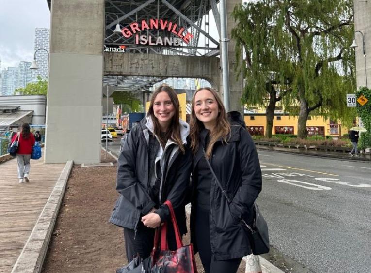 Micaela Stevenson and Ashleigh Strydom soak up the charm of Granville Island, Vancouver.