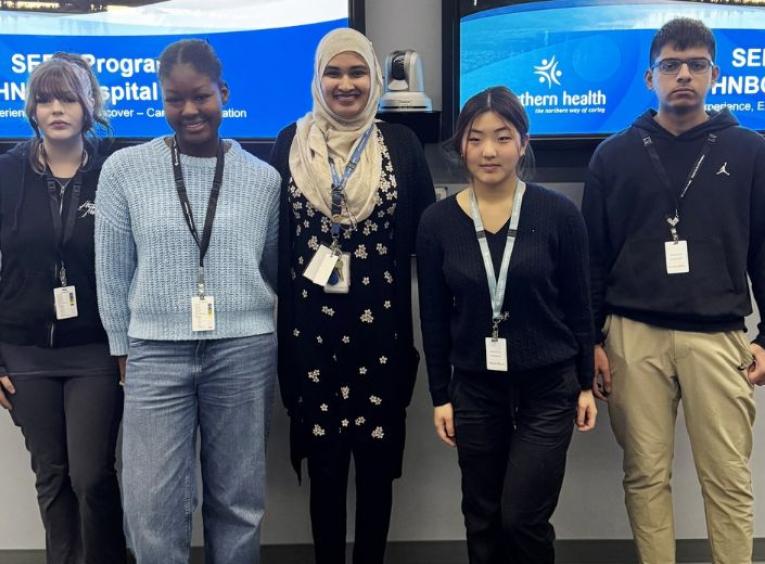Furqana Khan (center) and students participating in the SEED program on November 3, 2025.