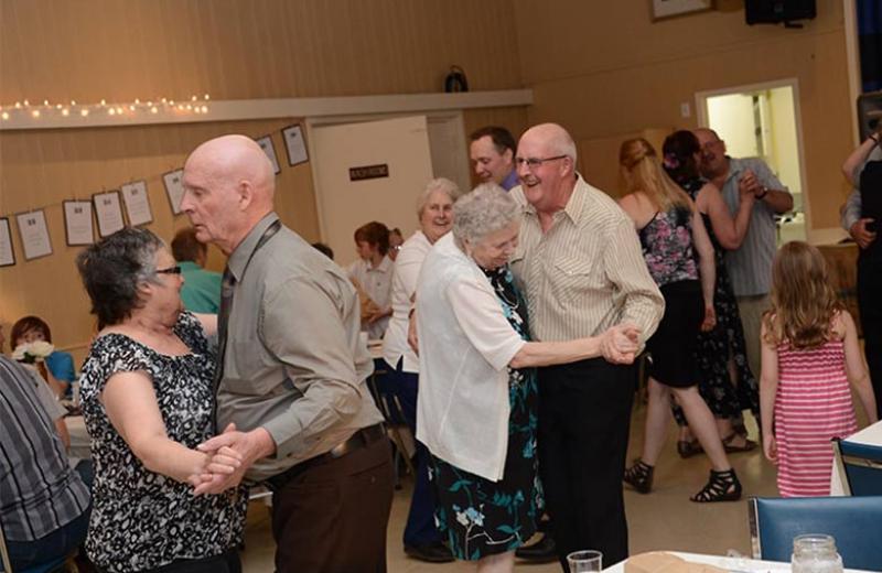 A group of senior's dancing.