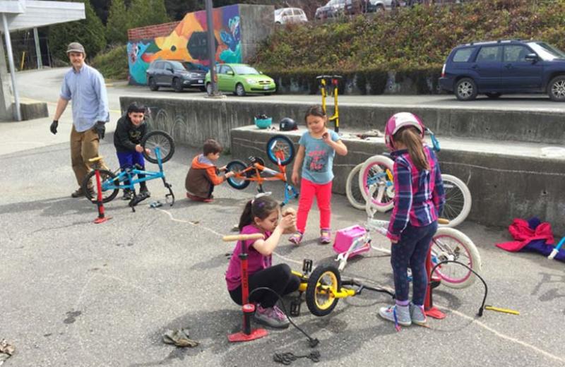 Kids working on bikes