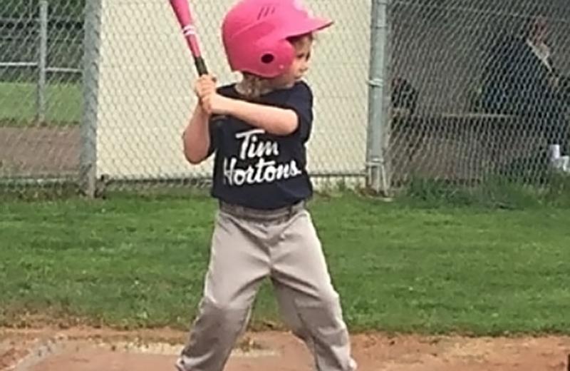 little boy up for bat baseball