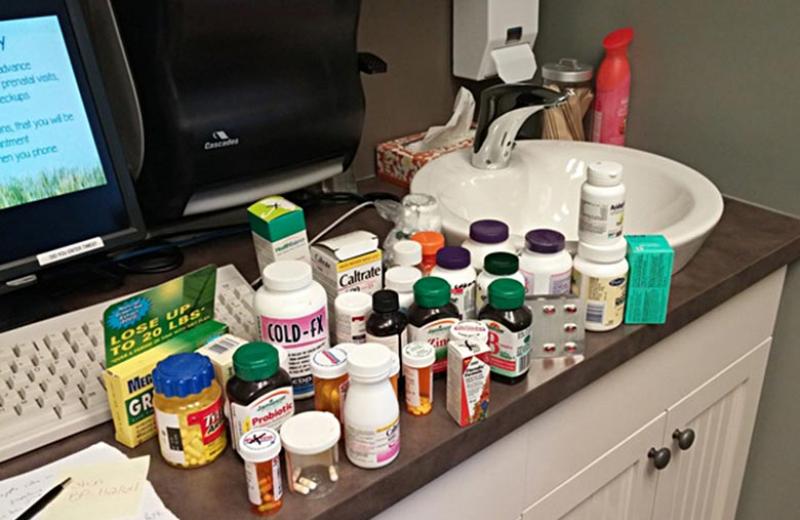 A wide variety of medications on the counter.