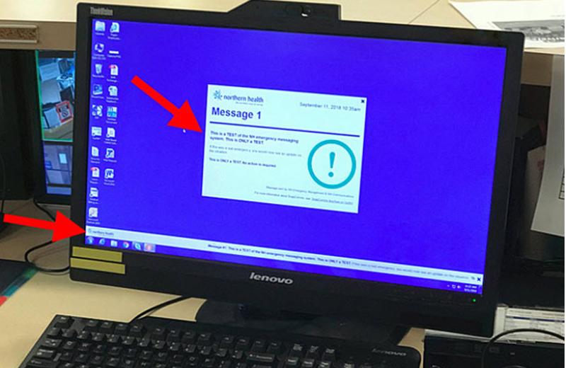 A desktop computer screen showing a popup test message.