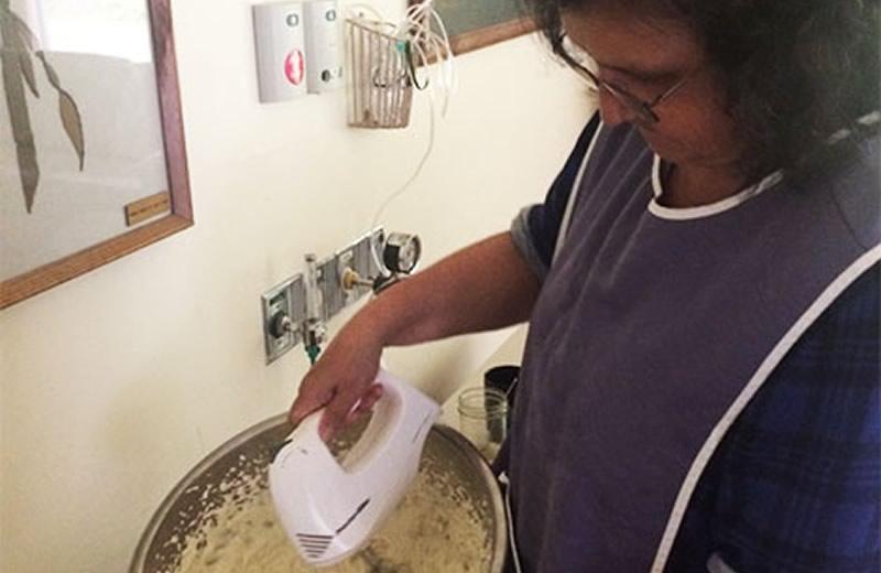 Woman preparing soapberry ice cream.