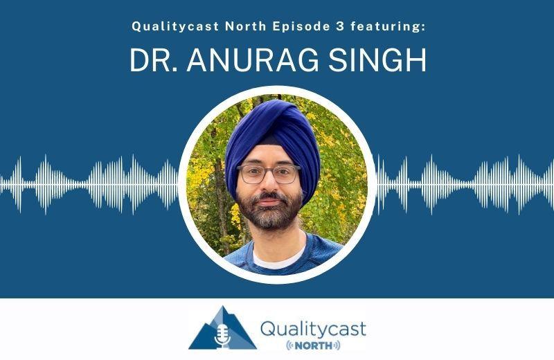 a picture of Dr. Anurag Singh  wearing a blue shirt and turban with green trees in the background