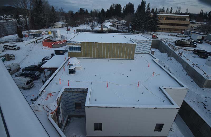 a construction cam still of a snowy roof
