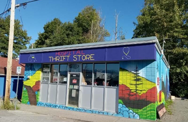 a picture of the thrift store with the new colourful mural