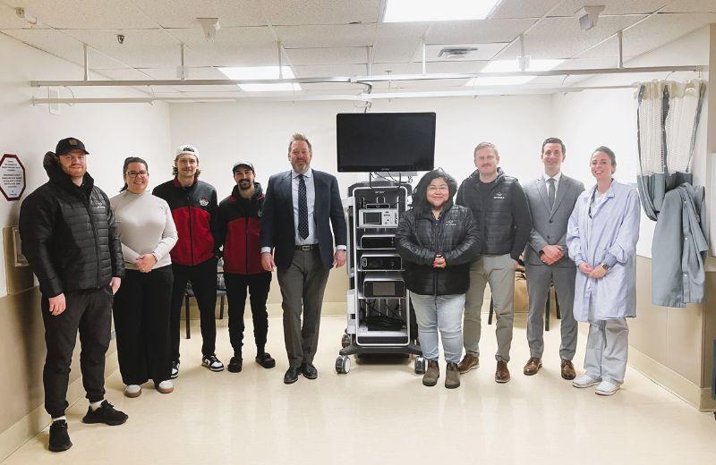 Representatives from Northern Health, the Prince Rupert Rampage, and the Prince Rupert Port Authority pose with the new hospital technology