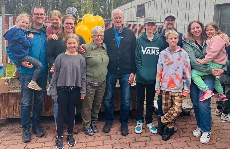 Cor van der Meulen (centre), with his wife, three sons, and their families, celebrated his retirement from Northern Health in April 2024. 