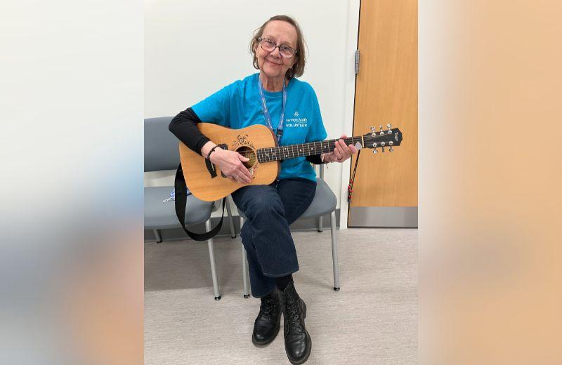 Hazel and her acoustic guitar