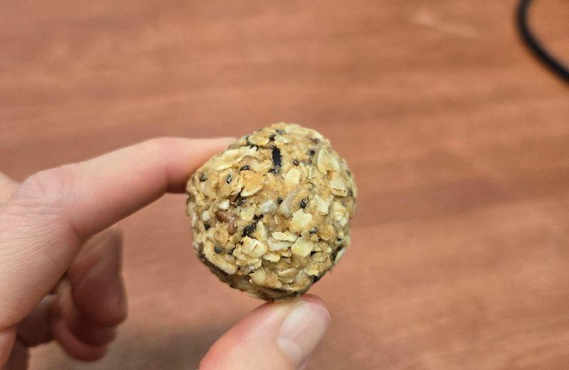 a hand holds a energy ball