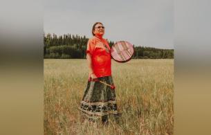 Lena Hjorth Drumming in a field