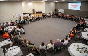 Metis health gathering group sit in circle