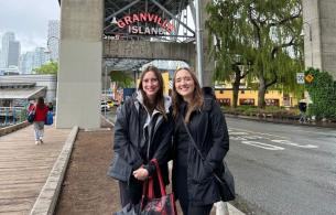 Micaela Stevenson and Ashleigh Strydom soak up the charm of Granville Island, Vancouver.