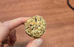 a hand holds a energy ball